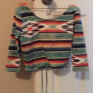 Adorable croptop w/ tied lace detail in back. S