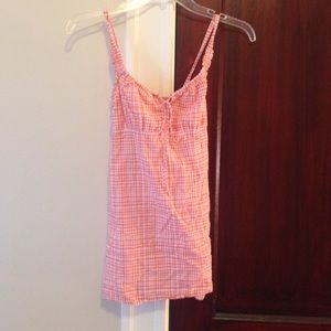 Orange and white checkered tie back