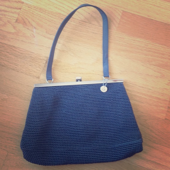 The Sak clutch in bluish gray