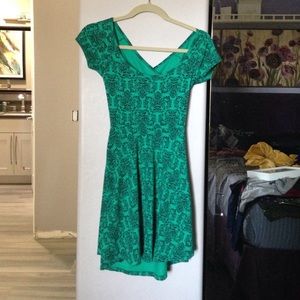 Green and black dress