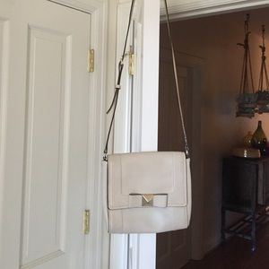 Leather Kate Sade cross-body with bow