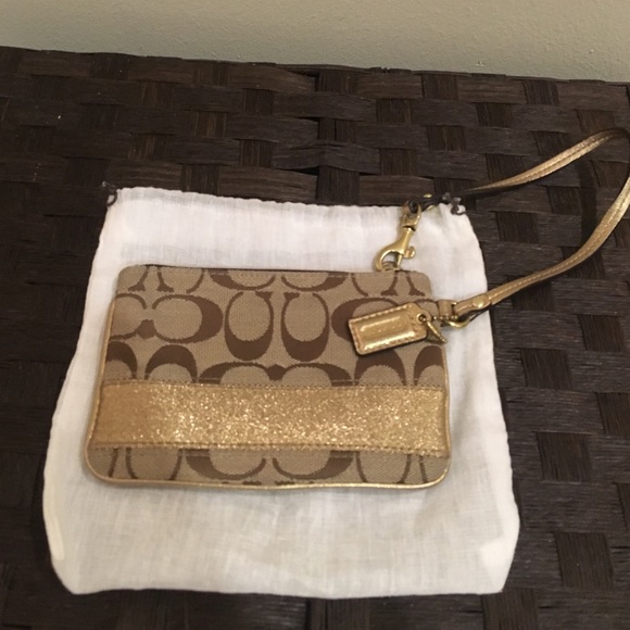 Coach gold wristlet