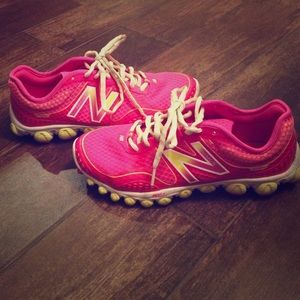 Hot pink and yellow New Balance Running shoes