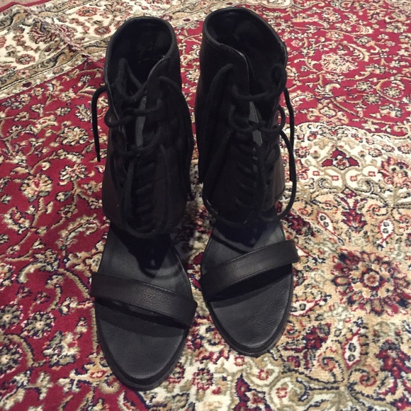 Heeled lace up booties
