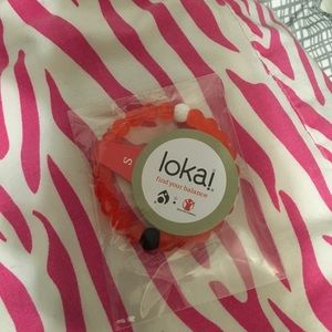 BRAND NEW RED LOKAI