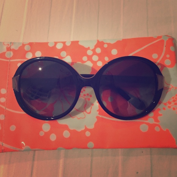 Kate spade sunglasses with neon pink trim
