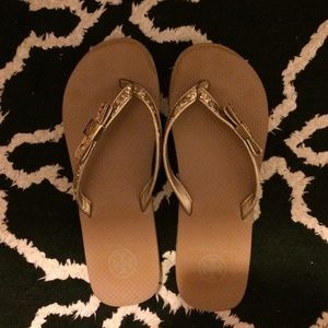 Tory burch gold flip flops
