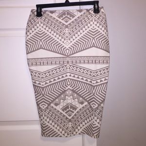 Long Kardashian Kollection tribal design skirt.