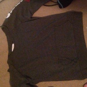 Front pocket, long sleeve over the shoulder shirt