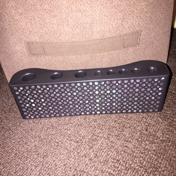 | make-up brush holder.