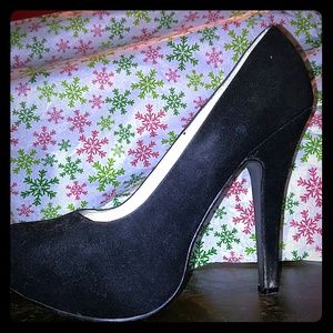 Black velvet stiletto heeled pumps