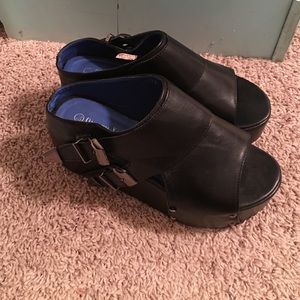 Black buckle platforms