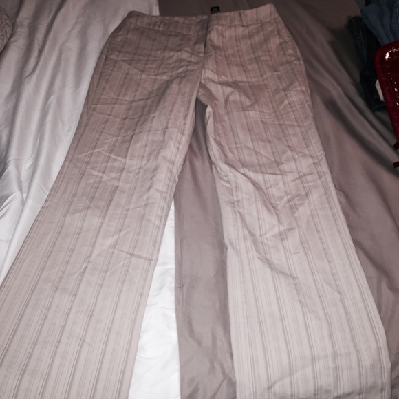 Professional cream pinstriped work pants.