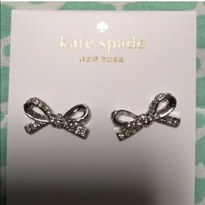 Kate spade earrings and north face jacket