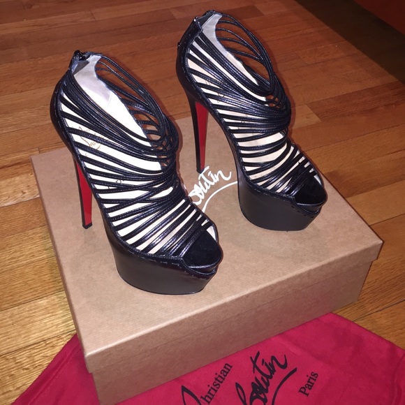EXCLUSIVE- Christian Louboutin strappy heels
