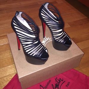 EXCLUSIVE- Christian Louboutin strappy heels