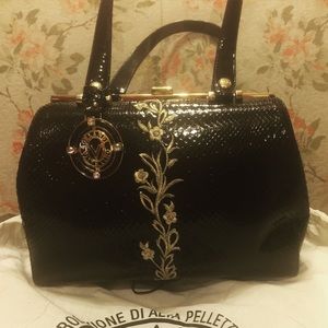 Valentino bag encrafted with premium gold stiches