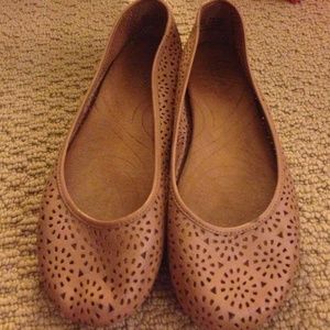 Tan eyelet flats