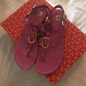 Purple and gold sandals .