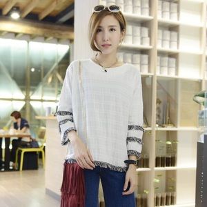 White long sleeve top with fringe