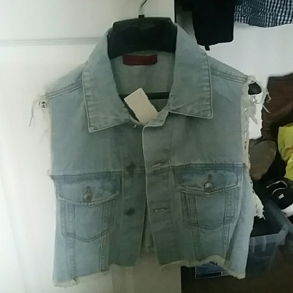 Never worn light blue jean vest
