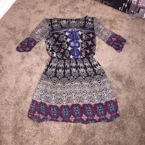 A black but yet very color patterned dress