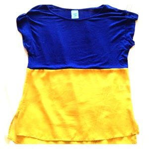 Two toned blouse with color blocking.