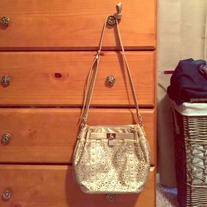 Gold, sparkly purse from The Buckle