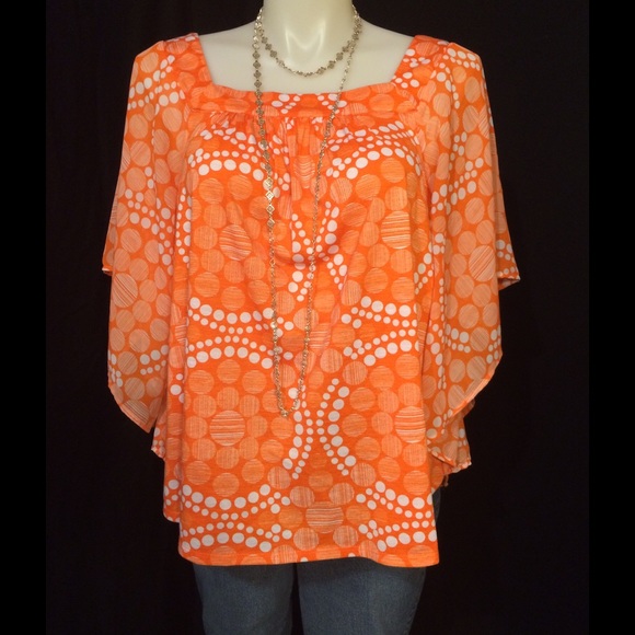 Orange dolman sleeve top