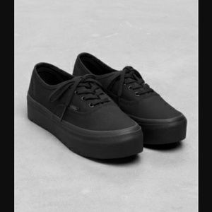 Black platform sneakers.