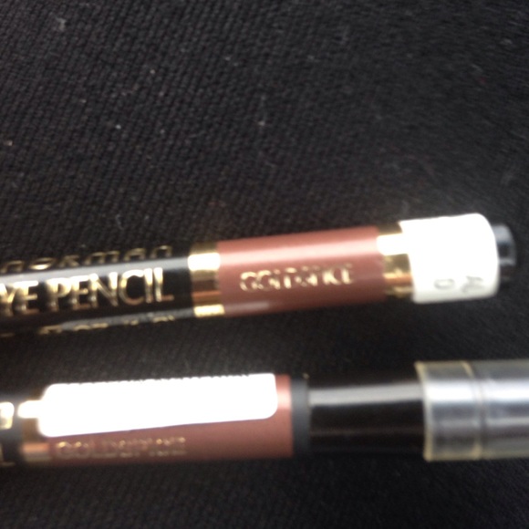 Merle Norman eye liner -Goldspice