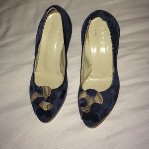 Blue suede peep toe pumps