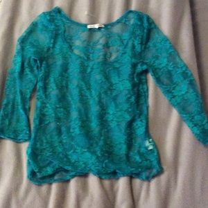 3 quarter lace teal colored top.