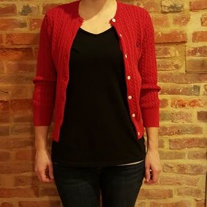 Cable knit cardigan sweater. 3/4 length sleeve.