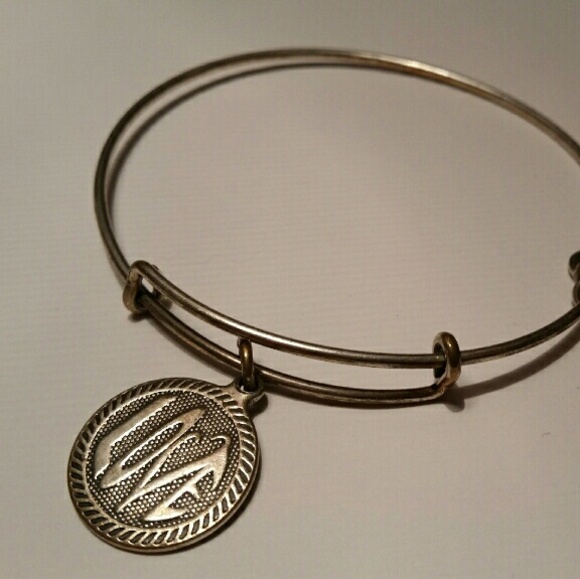 An Alex and Ani love silver bracelet