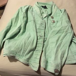 Mint green jacket.