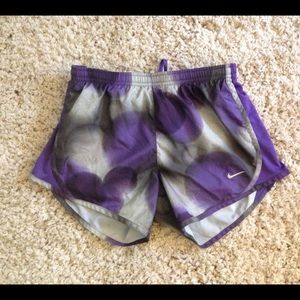 Purple Nike running shorts