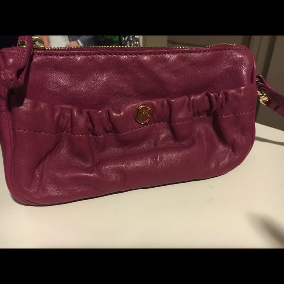 Cute Michael Kors leather wristlet.