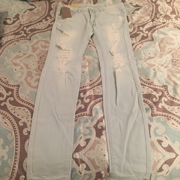 FADED LIGHT BLUE DISTRESSED SKINNY JEANS