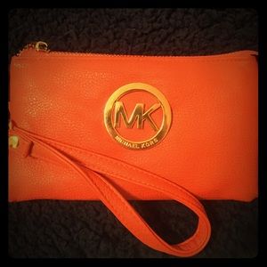 Michael Kors wristlet! Awesome bright orange color