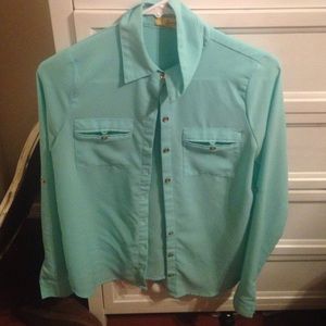 A sheer turquoise button up