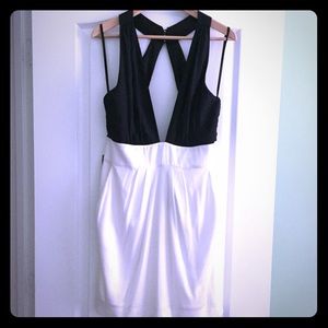 Black and white deep V Bebe dress