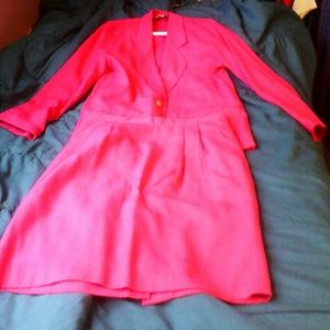 This is a womens pink skirt and  jacket suit