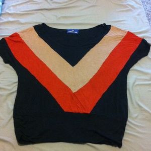 Tan orange and navy dress shirt.