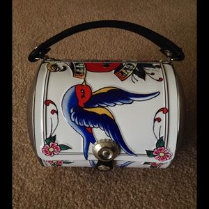 Little Earth metal purse.