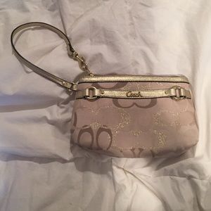 Gold coach wristlet