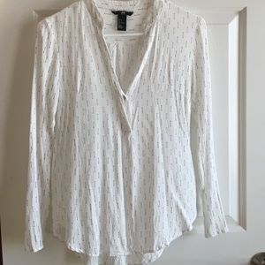 White blouse with small black arrows