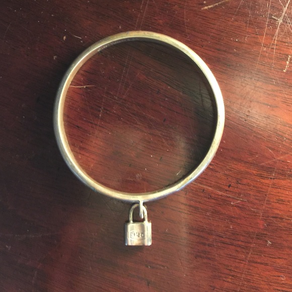 Sterling Tiffany bracket w charm that says t & co