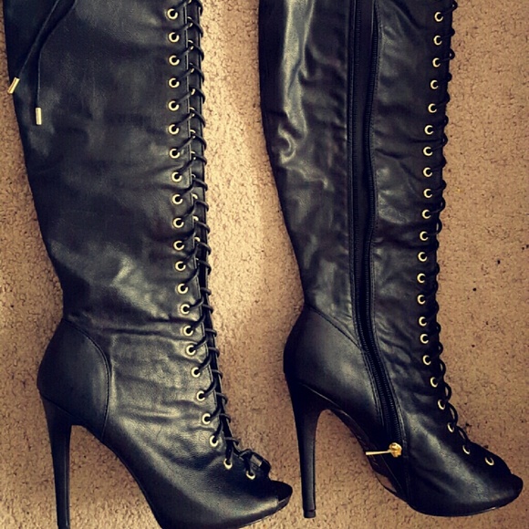 Knee high peep toe heels. Never worn