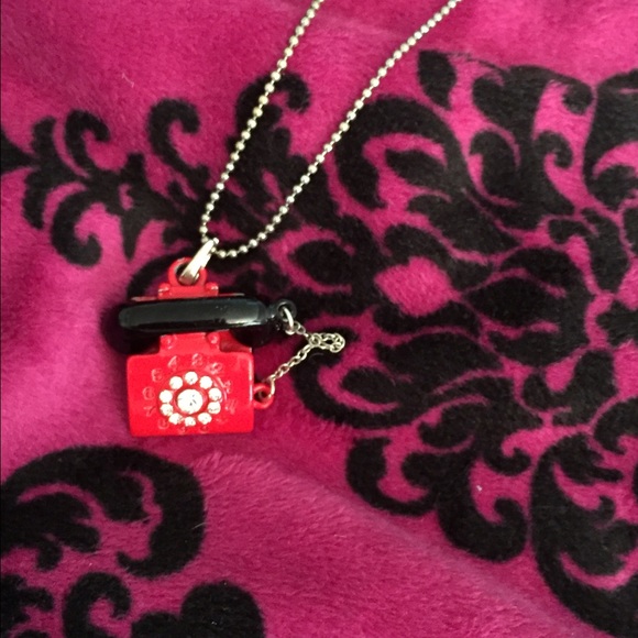 Magnetic telephone pendant necklace